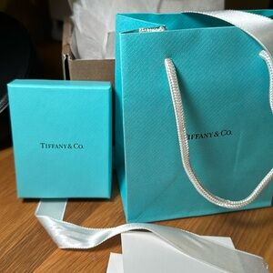 Tiffany packaging: blue box, gift card, envelope, ribbon, bag and shipping box